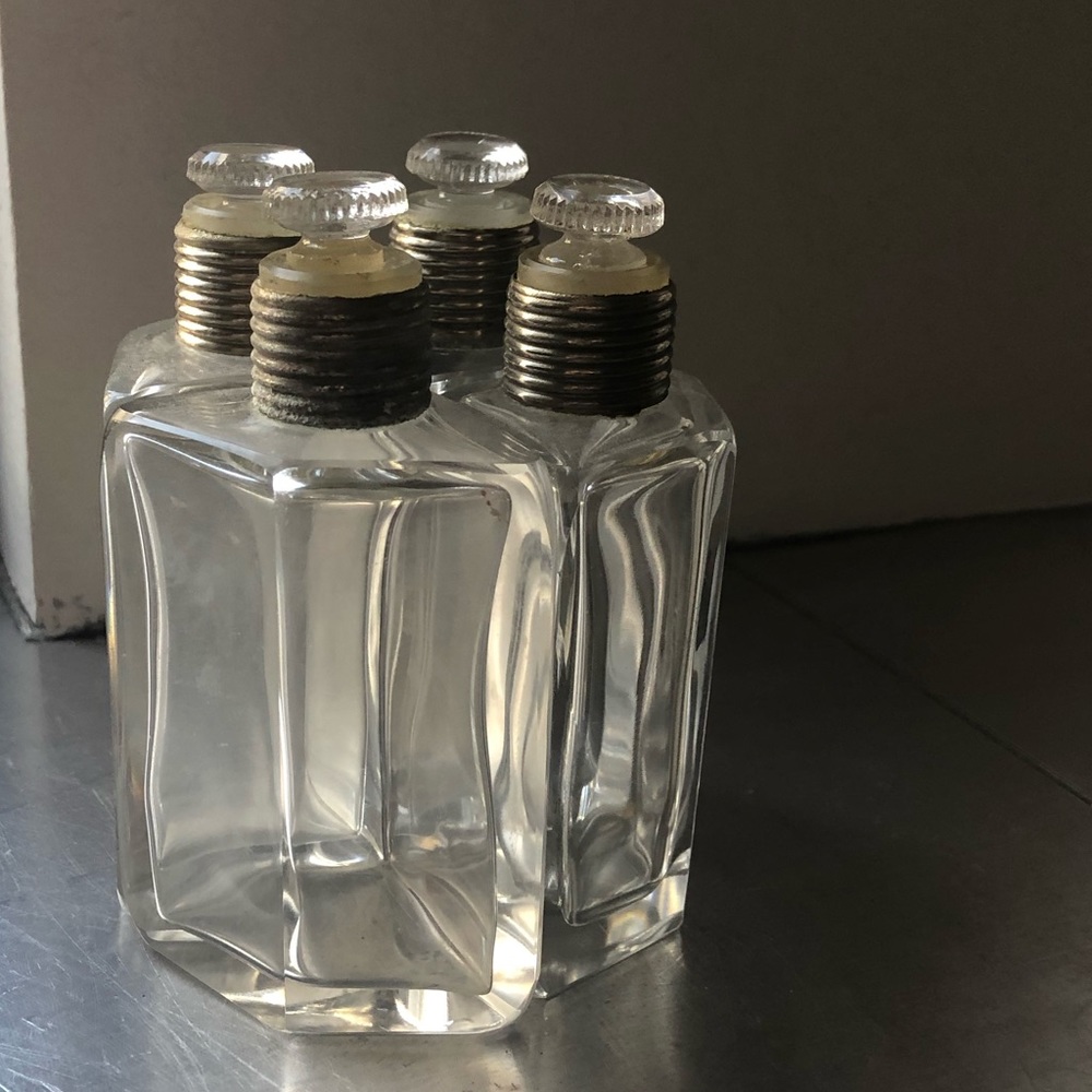 Vintage perfume vials. 4 that create a a circle.